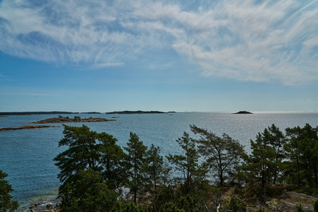 Beautiful coastline of the Swedish Baltic Sea with rocky cliffs along Skerry Archipelago in...