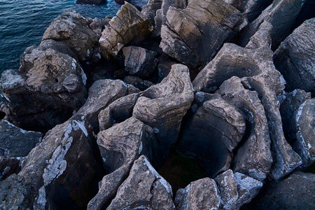 Peniche peninsula with high cliffs near Varanda de Pilatos in Portugal during dusk.の写真素材