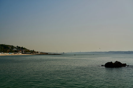Rocky coastline of the Atlantic ocean in Lisbon, capital of Portugal at the mouth of Tagus river...