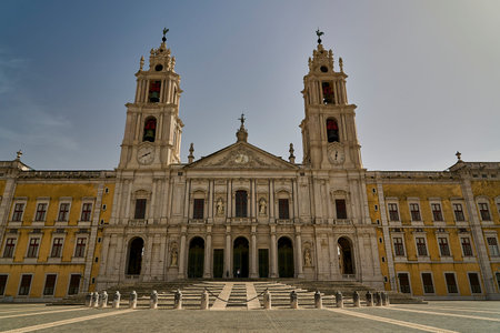 Mafra, Portugal - 10 06 2022: The grand Mafra National Palace in Portugal, with its impressive...