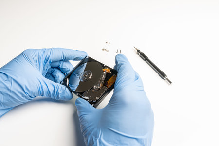 Check of a hard disk under laboratory conditions with gloves