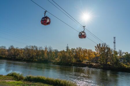 Orenburg-Russia-06 2019: a cable car that travels across the Ural in Orenburg during autumnのeditorial素材