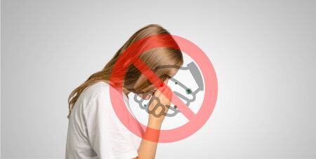 a woman with flu flying viruses and symbol not shaking handsの写真素材