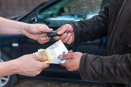 cash and key handover when buying a car on the road