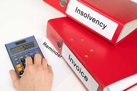 concept about a bankrupt person with file folder on the deskの写真素材
