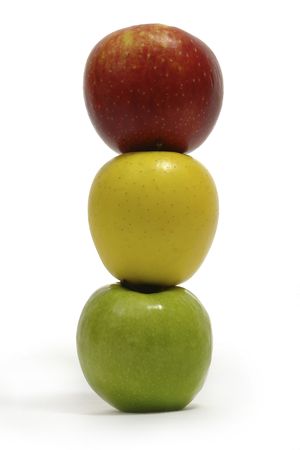   Tree apples, red, yellow & green are sating one on .                                の写真素材