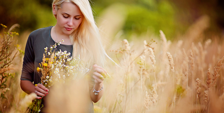 The girl in the fieldの写真素材