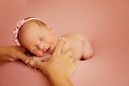 baby, pink smile hands momの写真素材