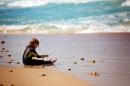 Summer vacation - little girl enjoying the sunの写真素材