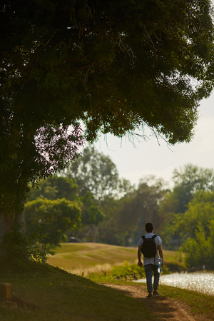 Man traveler with backpack hiking Travel Lifestyleの写真素材