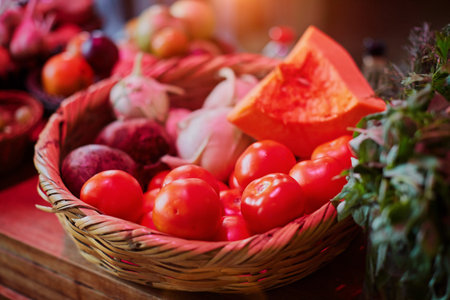 Basket with vegetables: vegetable marrow, pumpkin, eggplant, pepper, carrots, beet, cucumbers and...