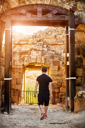 Man looking on Historic ancient templeの写真素材