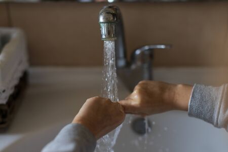 kid washes his hands correctly. How to wash your hands correctly. Hand washing . Coronavirusの写真素材