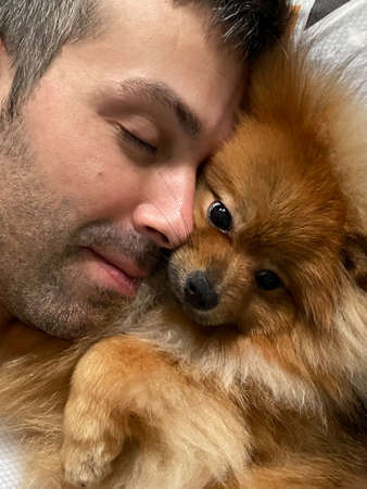 portrait of a man with a dogの写真素材