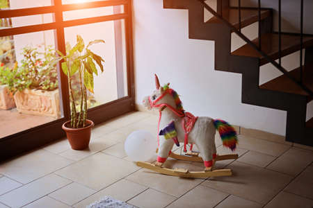 Rocking unicorn wooden toy vintage childhood itemの写真素材