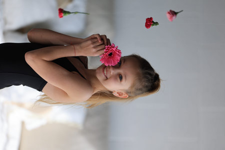 little girl with flowerの写真素材