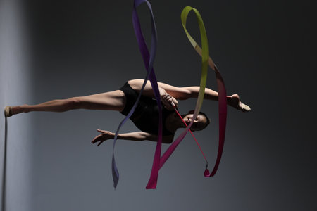An Exquisite Graceful Ribbon Dance Performance Exhibiting Dynamic and Flowing Motion Skillsの写真素材