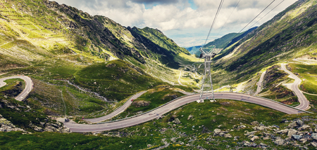 impressively beautiful View on Transfagarasan road with Ridge Fagaras. in sunny day. wonderful picturesque Scene. Europe, Romania. Transfagasan road, Transilvania.の写真素材