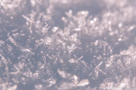 Snow winter background with snow texture closeup.の写真素材