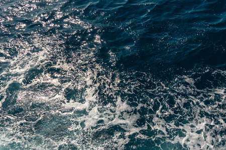 Background shot of aqua sea water surface. Abstract texture of nature. used as background.の写真素材