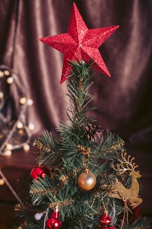 Christmas tree with a big red starの写真素材