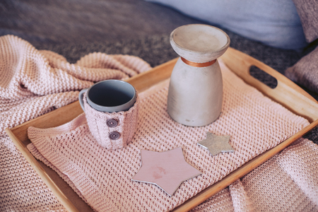 A tray with a jug and a mugの写真素材