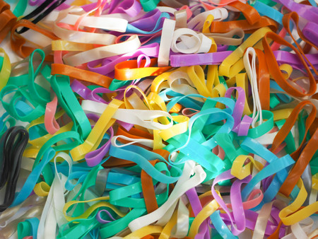 Colorful background rainbow colors rubber bands loom.の写真素材