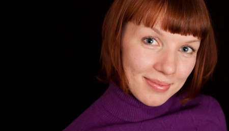 a young adult woman posing for a closeup portraitの写真素材