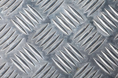a closeup of dirty corrugated sheet metalの写真素材