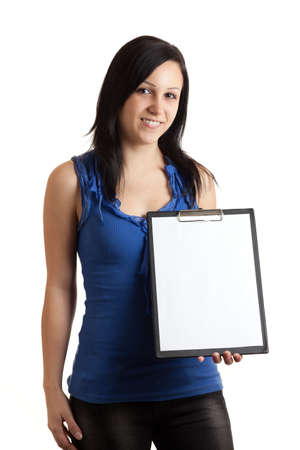 a young woman holding a clipboard with an empty sheet of paper isolated on whiteの写真素材