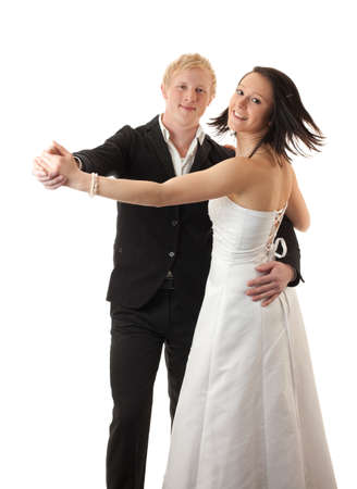 a young couple dancing isolated on whiteの写真素材
