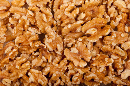 some walnut seeds forming a background pattern