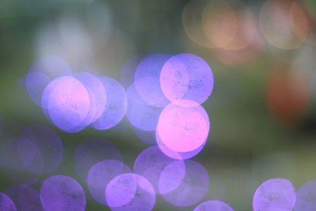 Purple light bokeh at nightの写真素材