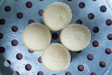 Four cupcakes is taken from aboveの写真素材