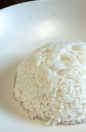 A pile of rice on the dishの写真素材