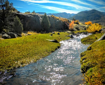 Utah Canyon Hiking Trail by river stream towards the Wasatch Mountains ATV four wheelingの写真素材