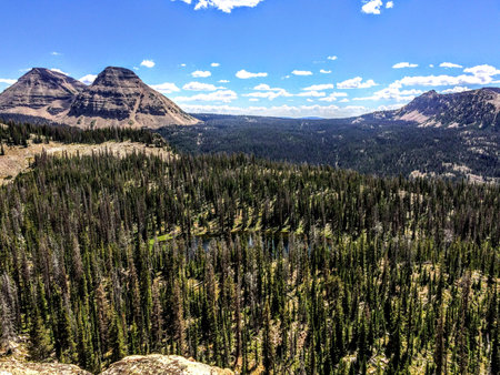Panoramic Landscape View of Uinta Mountains, clouds, lakes and forest, Utah, USA, America Western...