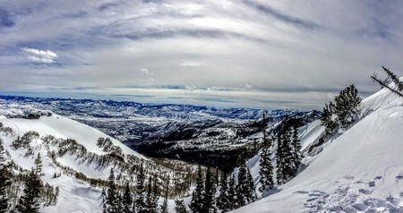 Winter Panoramic view of the back of the Wasatch Mountains Utah from the top of Brighton Ski Resort in the Rocky Mountainsの写真素材