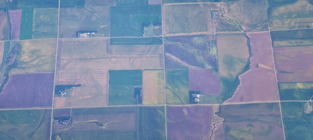 Aerial view of crop circles and squares over midwest states on flight over Colorado, Kansas,...