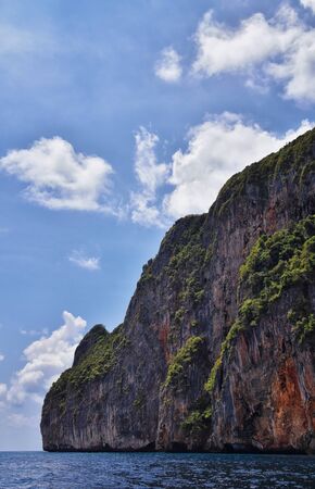 Island, Ocean views near Phuket Thailand with Blues, Turquoise and Greens oceans, mountains, boats, caves, trees resort island of phuket Thailand. Including Phi Phi, Ko Rang Yai, Ko Li Pe and other islands. Asia.の写真素材