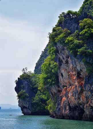 Island, Ocean views near Phuket Thailand with Blues, Turquoise and Greens oceans, mountains, boats, caves, trees resort island of phuket Thailand. Including Phi Phi, Ko Rang Yai, Ko Li Pe and other islands. Asia.の写真素材