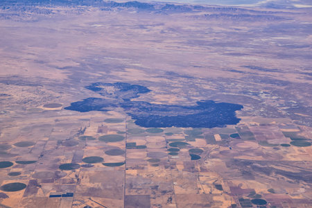 Colorado Rocky Mountains Aerial view from airplane of abstract Landscapes, peaks, canyons and rural cities in southwest Colorado and Utah. United States of America. USA.の写真素材