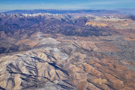 Rocky Mountains, Oquirrh range aerial views, Wasatch Front Rock from airplane. South Jordan, West Valley, Magna and Herriman, by the Great Salt Lake Utah. United States of America. USA.の写真素材