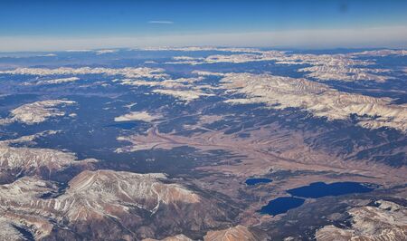 Colorado Rocky Mountains Aerial panoramic views from airplane of abstract Landscapes, peaks, canyons and rural cities in southwest Colorado and Utah. United States of America. USA.の写真素材