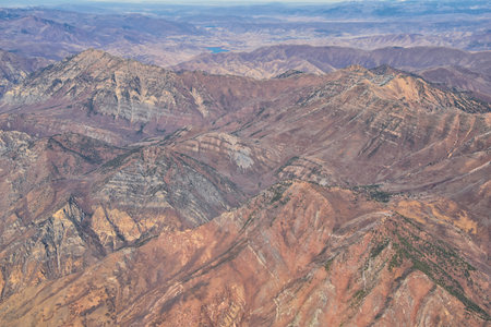 Wasatch Front Rocky Mountain Range Aerial view from airplane in fall including urban cities and the Great Salt Lake around Salt Lake City, Utah, United States of America. USA.の写真素材