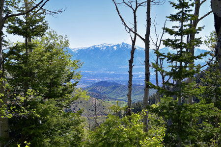 Rocky Mountain Wasatch Front peaks, panorama landscape view from Butterfield Canyon Oquirrh range by...