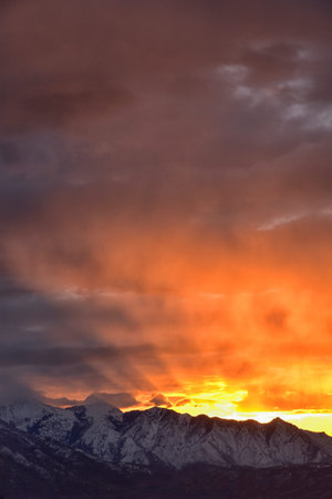 Sunrise view of winter panorama. Snow capped Mt Timpanogos in the Wasatch Front Rocky Mountains,...