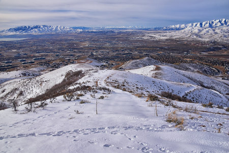 Maack Hill Sensei hiking trail views in snowy mountains, Lone Peak Wilderness Wasatch Rocky Mountains, Utah. USA.の写真素材