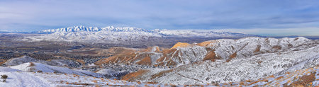 Maack Hill Sensei trail snowy mountain valley views in Lone Peak Wilderness Wasatch Rocky Mountains, Utah. USA.の写真素材