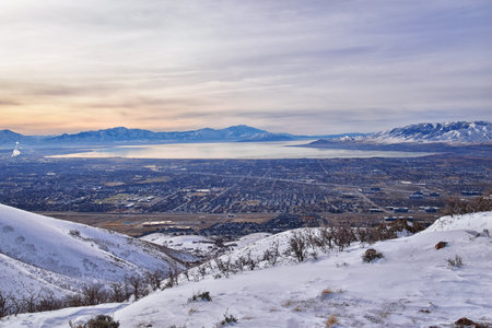Maack Hill Sensei trail snowy mountain valley views in Lone Peak Wilderness Wasatch Rocky Mountains, Utah. USA.の写真素材
